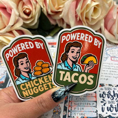 (158)  Powered by tacos… chicken nuggets - vinyl sticker