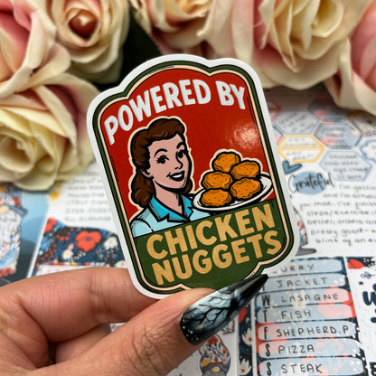 (158)  Powered by tacos… chicken nuggets - vinyl sticker